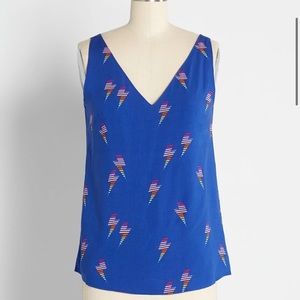 ModCloth blue tank with multi lightning bolts. Size 8. Never worn.